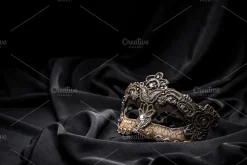 Brown carnival mask containing mask, venetian, and brown