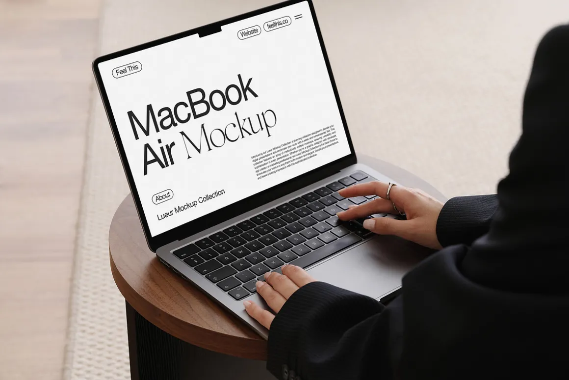 MacBook with Hands Mockup PSD